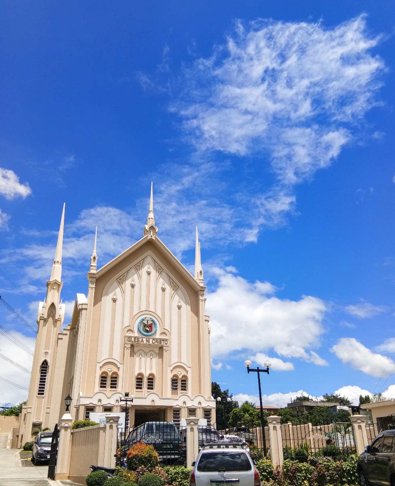 Iglesia Ni Cristo chapel exterior against a bright blue sky